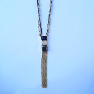Gold and black tone necklace